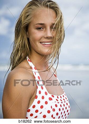Young woman at the beach. View Large Photo Image Stock Image - Young woman at the beach.. Fotosearch