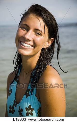 Young woman at the beach. View Large Photo Image Stock Image - Young woman at the beach.. Fotosearch