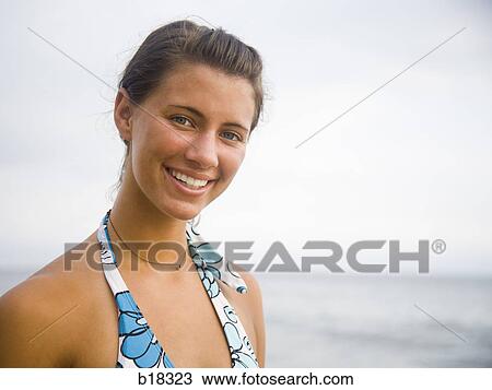 Young woman at the beach. View Large Photo Image Stock Image - Young woman at the beach.. Fotosearch