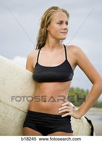 Young woman at the beach. View Large Photo Image Stock Photography - Young woman at the beach.. Fotosearch