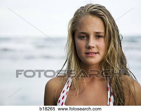 Young woman at the beach. View Large Photo Image Stock Photography - Young woman at the beach.. Fotosearch