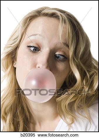 young woman chewing bubble gum View Large Photo Image Stock Photography - young woman chewing bubble gum. Fotosearch