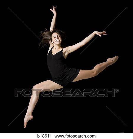 Young woman dancing. View Large Photo Image Stock Image - Young woman dancing.. Fotosearch