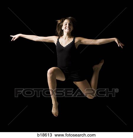 Young woman dancing. View Large Photo Image Stock Image - Young woman dancing.. Fotosearch