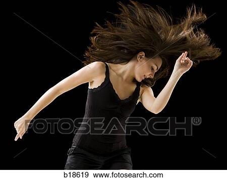 Young woman dancing. View Large Photo Image Stock Photo - Young woman dancing.. Fotosearch
