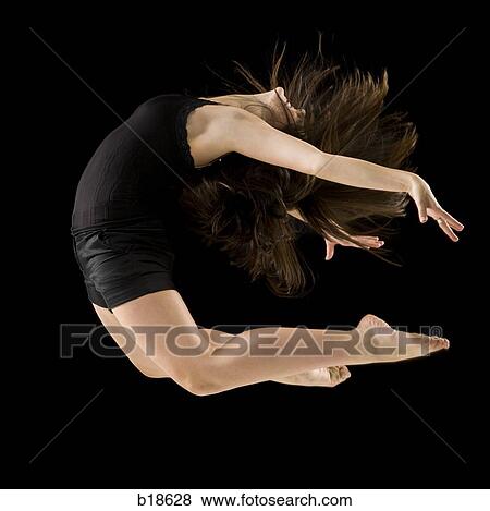 Young woman dancing. View Large Photo Image Stock Photo - Young woman dancing.. Fotosearch