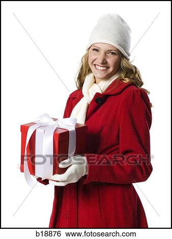 young woman holding a gift. View Large Photo Image Stock Photograph - young woman holding a gift.. Fotosearch