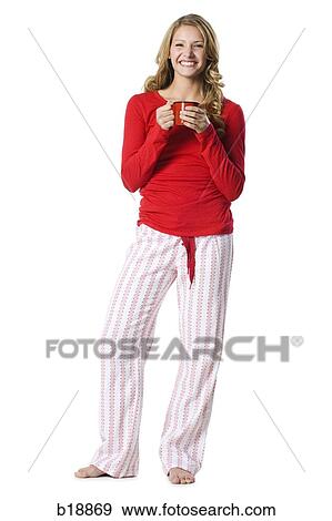 young woman holding a red mug. View Large Photo Image Stock Photo - young woman holding a red mug.. Fotosearch