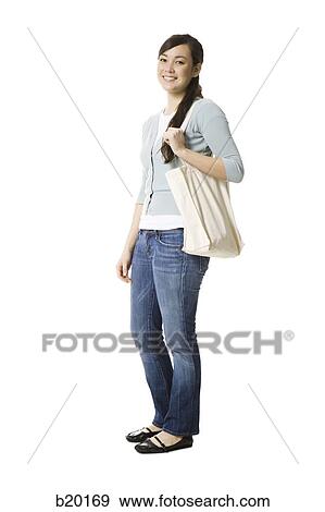 Stock Photo - young woman in a cardigan. Fotosearch