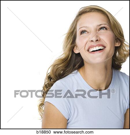 Stock Image - young woman in a gray shirt.. Fotosearch