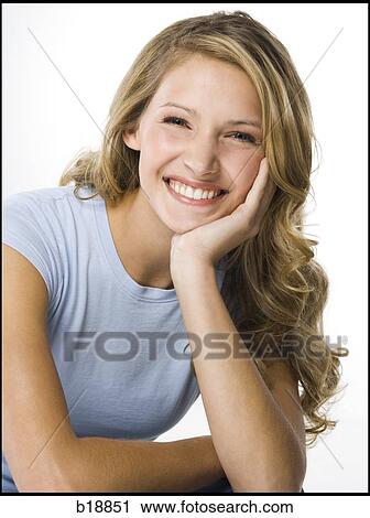 young woman in a gray shirt. View Large Photo Image Stock Image - young woman in a gray shirt.. Fotosearch