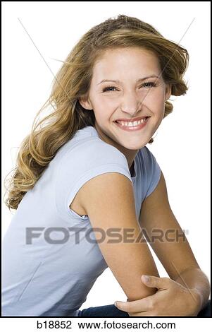 young woman in a gray shirt. View Large Photo Image Stock Image - young woman in a gray shirt.. Fotosearch