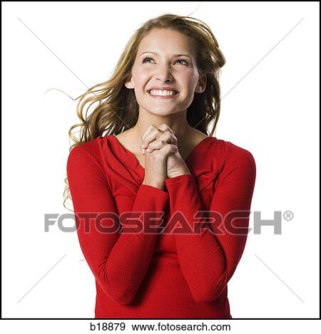 Stock Photo - young woman in a red sweater.. Fotosearch