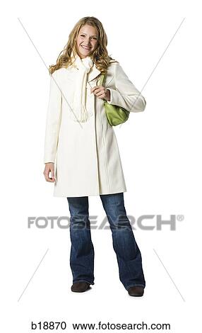 young woman in a white overcoat. View Large Photo Image Stock Image - young woman in a white overcoat.. Fotosearch