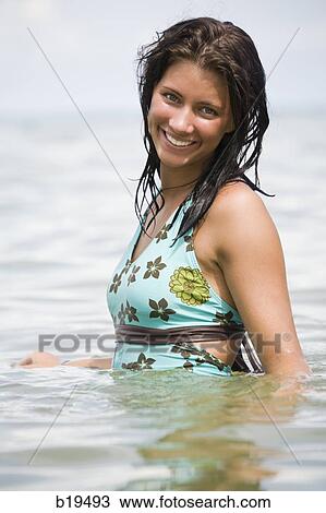 young woman in the water View Large Photo Image Stock Image - young woman in the water. Fotosearch