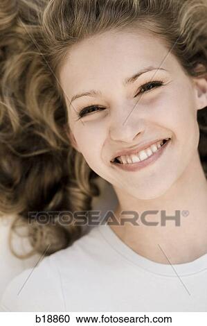 young woman smiling. View Large Photo Image Stock Image - young woman smiling.. Fotosearch