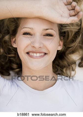young woman smiling. View Large Photo Image Stock Image - young woman smiling.. Fotosearch
