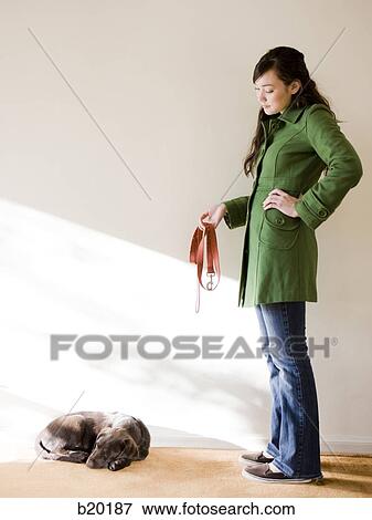 young woman with a brown puppy View Large Photo Image Stock Photo - young woman with a brown puppy. Fotosearch