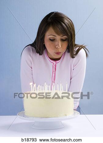 Young woman with a cake. View Large Photo Image Stock Image - Young woman with a cake.. Fotosearch