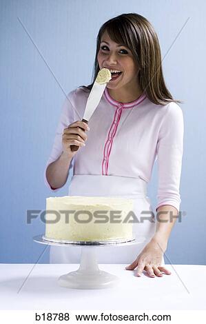 Young woman with a cake. View Large Photo Image Stock Photo - Young woman with a cake.. Fotosearch