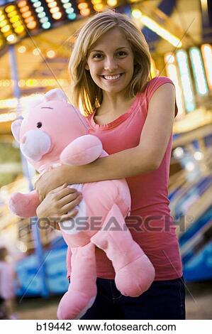 young woman with a stuffed animal View Large Photo Image Stock Image - young woman with a stuffed animal. Fotosearch