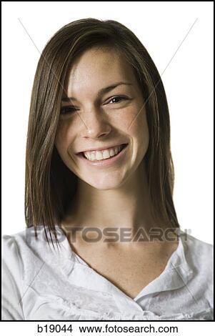"young woman with a white shirt, smiling. " View Large Photo Image Picture - "young woman with a white shirt, smiling. ". Fotosearch