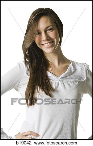 "young woman with a white shirt, smiling. " View Large Photo Image Stock Image - "young woman with a white shirt, smiling. ". Fotosearch