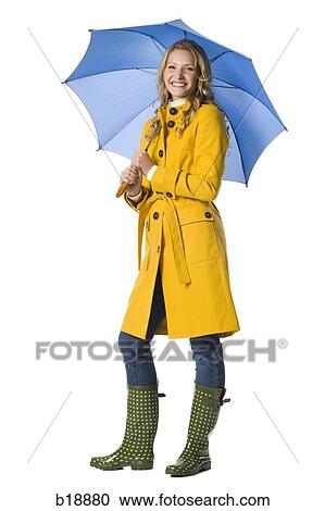 Young woman with an umbrella. View Large Photo Image Stock Image - Young woman with an umbrella.. Fotosearch