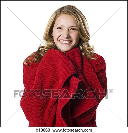 young woman wrapped in a blanket. View Large Photo Image Stock Photo - young woman wrapped in a blanket.. Fotosearch