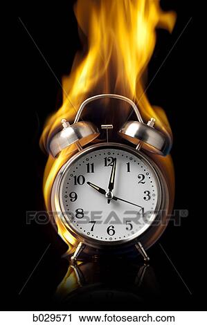alarm clock on fire View Large Photo Image Stock Image - alarm clock on fire. Fotosearch
