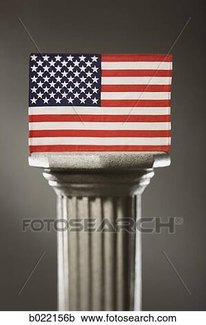 Stock Image - American flag on a pedestal. Fotosearch