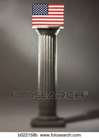 Stock Image - American flag on a pedestal. Fotosearch