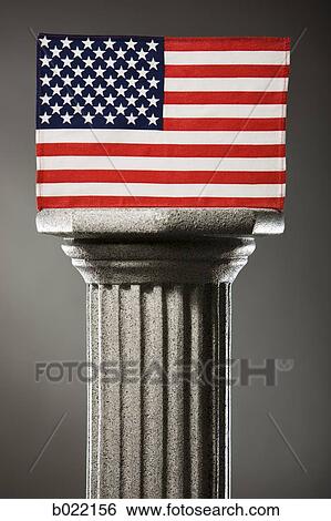 Stock Photograph - American flag on a pedestal. Fotosearch