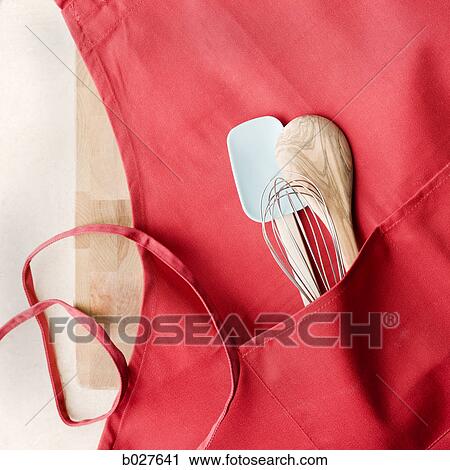 Stock Image - apron with cooking utensils in it. Fotosearch