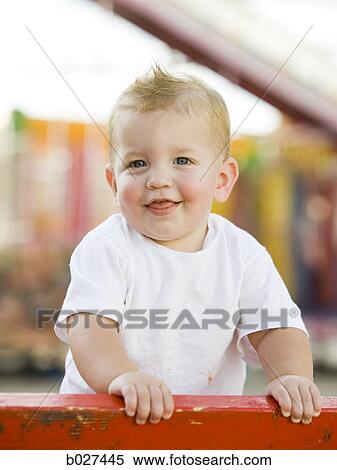 baby at a carnival View Large Photo Image Stock Photography - baby at a carnival. Fotosearch