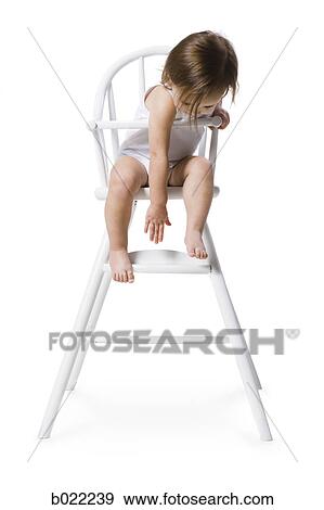 baby girl in a high chair View Large Photo Image Stock Photo - baby girl in a high chair. Fotosearch