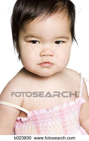 baby girl in a pink dress View Large Photo Image Stock Image - baby girl in a pink dress. Fotosearch