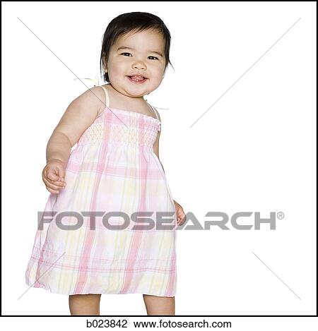 baby girl in a pink dress View Large Photo Image Stock Image - baby girl in a pink dress. Fotosearch