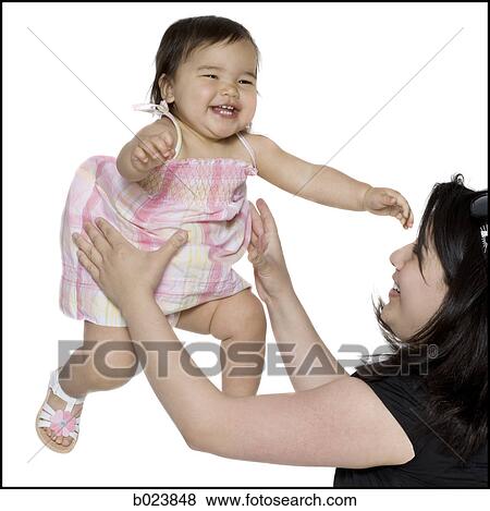 baby girl in a pink dress View Large Photo Image Stock Photo - baby girl in a pink dress. Fotosearch