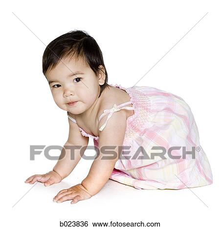 baby girl in a pink dress View Large Photo Image Stock Photograph - baby girl in a pink dress. Fotosearch