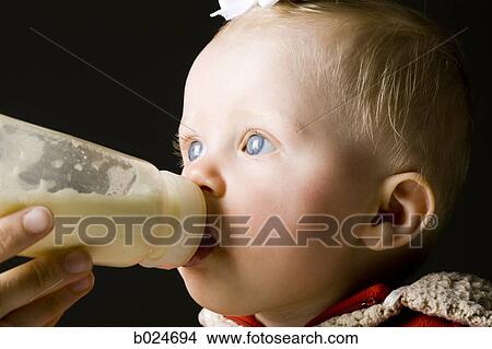 baby girl in a red coat View Large Photo Image Picture - baby girl in a red coat. Fotosearch