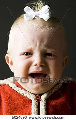 baby girl in a red coat View Large Photo Image Stock Photograph - baby girl in a red coat. Fotosearch