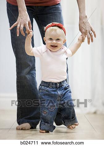 baby girl learning to walk View Large Photo Image Stock Image - baby girl learning to walk. Fotosearch