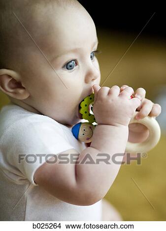 baby girl playing with a toy View Large Photo Image Picture - baby girl playing with a toy. Fotosearch