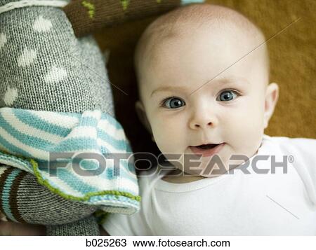 baby girl playing with a toy View Large Photo Image Stock Image - baby girl playing with a toy. Fotosearch
