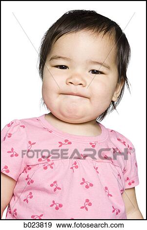 baby in a pink shirt View Large Photo Image Stock Photo - baby in a pink shirt. Fotosearch