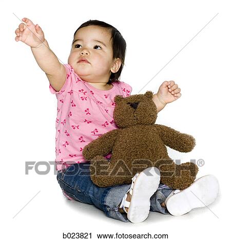 baby in a pink shirt with a teddy bear View Large Photo Image Stock Image - baby in a pink shirt with a teddy bear. Fotosearch