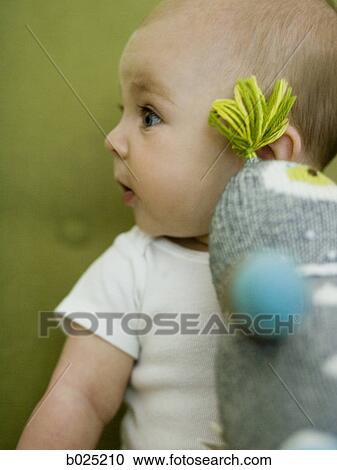 baby with a stuffed animal View Large Photo Image Stock Image - baby with a stuffed animal. Fotosearch