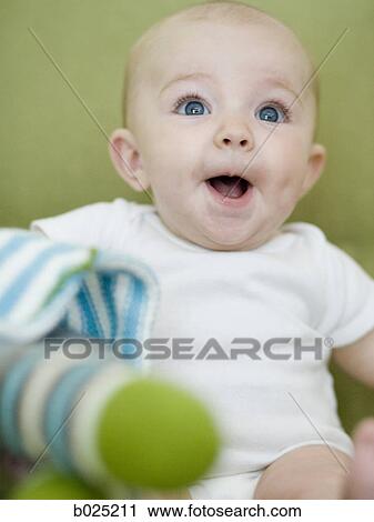 baby with a stuffed animal View Large Photo Image Stock Image - baby with a stuffed animal. Fotosearch