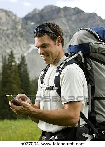 backpackers hiking through the wilderness View Large Photo Image Picture - backpackers hiking through the wilderness. Fotosearch